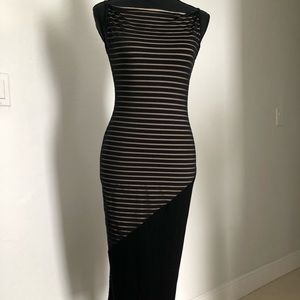 Sexy black bodycon dress, with nude lining.